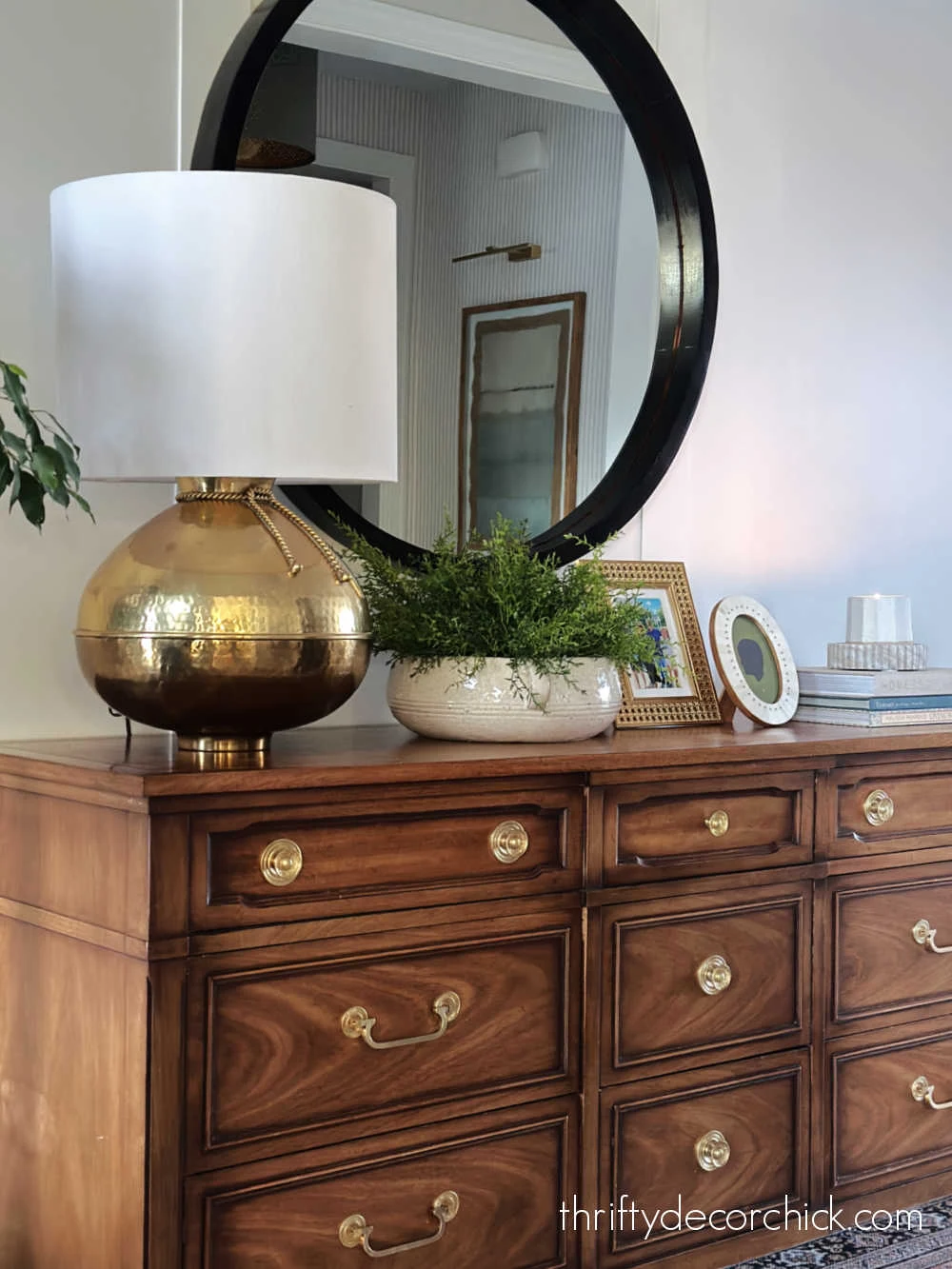 wood dresser with round mirror